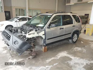 2006 Honda CR-V EX with VIN JHLRD78856C033763, listed as a IAAI auction lot 41715433 with 220,490 mi miles and . Bid and sale history available at carsss.com. Image 2.