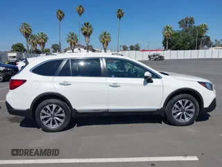 2018 Subaru Outback Touring with VIN 4S4BSATC7J3347691, listed as a IAAI auction lot 42609038 with 48,300 mi miles and . Bid and sale history available at DreamBid. Image 13.