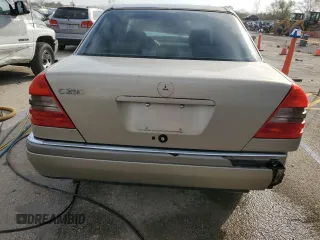 1997 Mercedes-Benz C z VIN WDBHA23EXVF601373, wystawiony jako Copart lot #78402194 z przebiegiem 187 821 mil mil oraz Szkoda całkowita • Salvage title. Historia ofert i sprzedaży dostępna na DreamBid. Obrazek 6.