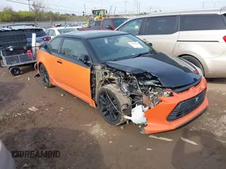 2015 Scion tC with VIN JTKJF5C7XFJ008076, listed as a IAAI auction lot 40856462 with 155,117 mi miles. Bid and sale history available at carsss.com. Image 1.