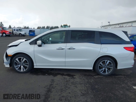 2022 Honda Odyssey Touring with VIN 5FNRL6H8XNB057293, listed as a IAAI auction lot 41826014 with 30,454 mi miles and . Bid and sale history available at DreamBid. Image 14.
