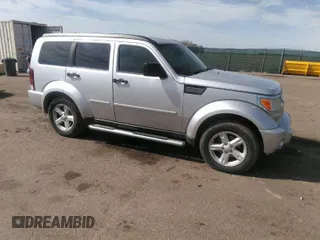 2007 Dodge Nitro SLT with VIN 1D8GU58K07W565458, listed as a IAAI auction lot 41793488 with 186,728 mi miles. Bid and sale history available at carsss.com. Image 1.