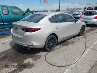 2024 Mazda 3 S Select Sport with VIN 3MZBPABMXRM427929, listed as a IAAI auction lot 42593321 with 20,378 mi miles and . Bid and sale history available at DreamBid. Image 4.