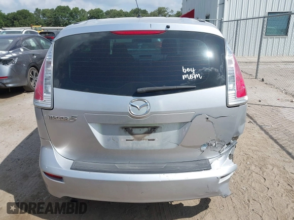 2009 Mazda 5 Sport z VIN JM1CR293090355422, wystawiony jako IAAI lot #42567279 z przebiegiem 214 402 mil mil oraz . Historia ofert i sprzedaży dostępna na DreamBid. Obrazek 16.