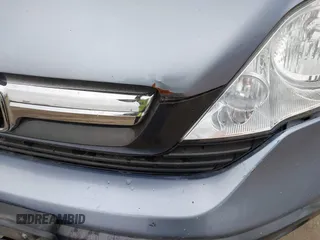 2007 Honda CR-V EX z VIN JHLRE48577C074317, wystawiony jako IAAI lot #42382403 z przebiegiem 383 109 mil mil oraz . Historia ofert i sprzedaży dostępna na DreamBid. Obrazek 6.
