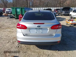 2016 Ford Focus SE with VIN 1FADP3F27GL390830, listed as a IAAI auction lot 41665012 with 119,673 mi miles. Bid and sale history available at carsss.com. Image 16.