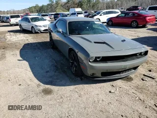 2019 Dodge Challenger SXT z VIN 2C3CDZAG4KH521999, wystawiony jako Copart lot #42093645 z przebiegiem 83 704 mil mil oraz Szkoda całkowita • Salvage title. Historia ofert i sprzedaży dostępna na DreamBid. Obrazek 11.