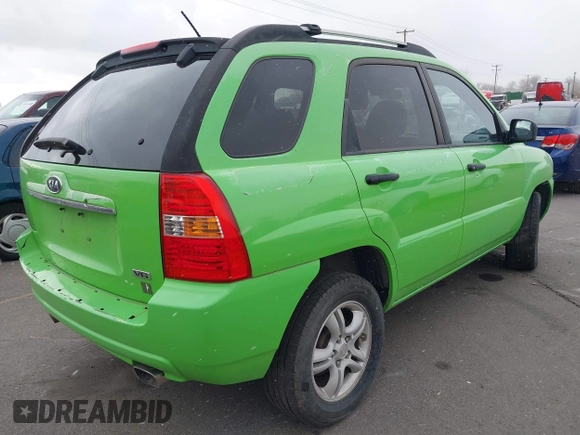 2008 Kia Sportage LX with VIN KNDJE723287471835, listed as a IAAI auction lot 41268401 with 200,404 mi miles and . Bid and sale history available at DreamBid. Image 4.