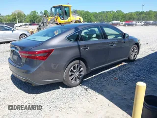2016 Toyota Avalon Limited with VIN 4T1BK1EB4GU208979, listed as a IAAI auction lot 42032374 with 242,738 mi miles and . Bid and sale history available at carsss.com. Image 4.