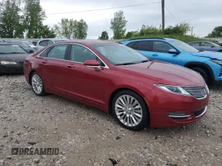 2016 Lincoln MKZ z VIN 3LN6L2J95GR605230, wystawiony jako Copart lot #57844905 z przebiegiem 95 530 mil mil oraz Czysty tytuł • Clean title. Historia ofert i sprzedaży dostępna na DreamBid. Obrazek 4.