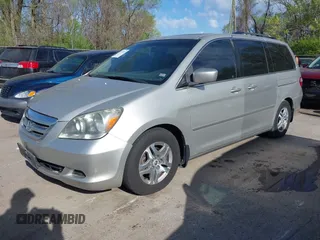2006 Honda Odyssey EX-L z VIN 5FNRL38786B428264, wystawiony jako IAAI lot #41974479 z przebiegiem 187 595 mil mil oraz . Historia ofert i sprzedaży dostępna na DreamBid. Obrazek 2.