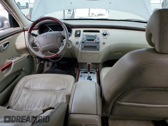 2006 Hyundai Azera SE z VIN KMHFC46F76A054625, wystawiony jako Copart lot #56588315 z przebiegiem 178 667 mil mil oraz Szkoda całkowita • Salvage title. Historia ofert i sprzedaży dostępna na DreamBid. Obrazek 8.