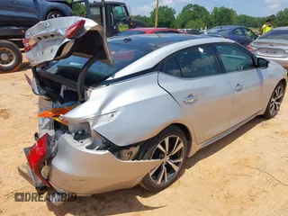 2016 Nissan Maxima SR with VIN 1N4AA6AP7GC389606, listed as a IAAI auction lot 42451614 with 114,957 mi miles and . Bid and sale history available at DreamBid. Image 4.