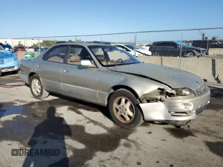 1995 Lexus ES 300 with VIN JT8GK13T6S0101694, listed as a Copart auction lot 77683754 with 247,984 mi miles and Salvage Title. Bid and sale history available at DreamBid. Image 4.
