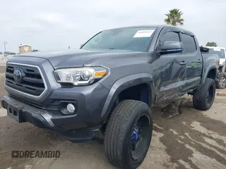 2018 Toyota Tacoma SR5 with VIN 5TFAZ5CNXJX066952, listed as a IAAI auction lot 41894562 with 141,818 mi miles and . Bid and sale history available at DreamBid. Image 17.