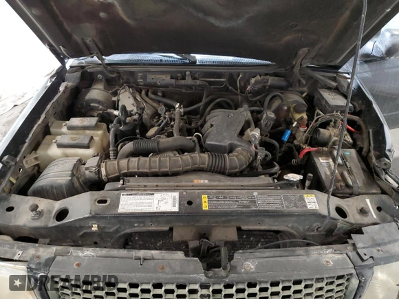 2002 Ford Ranger with VIN 1FTZR15U52PA08409, listed as a Copart auction lot 87858015 with 128,892 mi miles and Salvage Title. Bid and sale history available at DreamBid. Image 12.