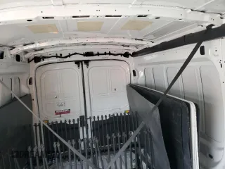2023 Ford Transit Cargo с VIN 1FTBR2C80PKB31083, выставлен на аукционе Copart как лот 50551005 с пробегом 54 390 миль миль и Списание • Salvage title. История ставок и продаж доступна на DreamBid. Изображение 10.