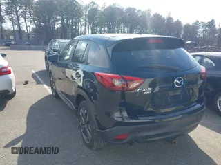 2016 Mazda CX-5 Grand Touring with VIN JM3KE4DY5G0681436, listed as a IAAI auction lot 41664780 with 172,199 mi miles. Bid and sale history available at carsss.com. Image 3.