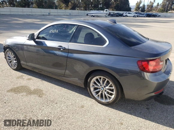 2015 BMW 2 Series 228i with VIN WBA1F5C50FV256459, listed as a Copart auction lot 56518723 with 65,653 mi miles. Bid and sale history available at carsss.com. Image 2.