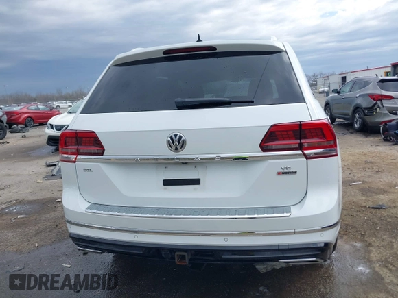 2019 Volkswagen Atlas SEL R-Line with VIN 1V2RR2CA6KC594588, listed as a IAAI auction lot 41686713 with 125,180 mi miles and . Bid and sale history available at DreamBid. Image 16.