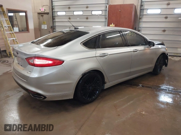 2014 Ford Fusion SE with VIN 3FA6P0H90ER290746, listed as a IAAI auction lot 41333537 with 148,755 mi miles. Bid and sale history available at carsss.com. Image 4.