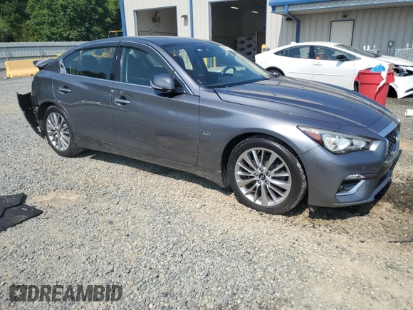 2018 Infiniti Q50 Luxe with VIN JN1EV7AR8JM443555, listed as a Copart auction lot 59691455 with 65,615 mi miles and Salvage title. Bid and sale history available at DreamBid. Image 4.