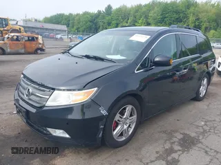 2011 Honda Odyssey Touring with VIN 5FNRL5H93BB104906, listed as a IAAI auction lot 42371279 with 183,856 mi miles and . Bid and sale history available at DreamBid. Image 17.