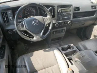 2014 Honda Ridgeline RTL with VIN 5FPYK1F58EB012869, listed as a Copart auction lot 51854995 with 318,950 mi miles and Salvage title. Bid and sale history available at DreamBid. Image 8.