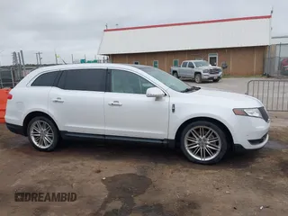 2014 Lincoln MKT EcoBoost with VIN 2LMHJ5AT0EBL50661, listed as a IAAI auction lot 41898237 with 118,770 mi miles and . Bid and sale history available at DreamBid. Image 13.