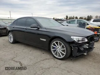 2015 BMW 7 Series 750Li xDrive z VIN WBAYF8C54FD654795, wystawiony jako Copart lot #82381894 z przebiegiem 56 968 mil mil oraz Szkoda całkowita • Salvage title. Historia ofert i sprzedaży dostępna na DreamBid. Obrazek 4.