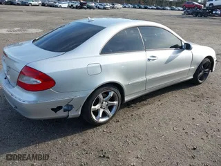 2009 Mercedes-Benz CLK-Class 3.5L with VIN WDBTJ56H89F266069, listed as a IAAI auction lot 41993748 with 141,828 mi miles. Bid and sale history available at carsss.com. Image 4.