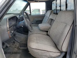 1989 Ford F-150 with VIN 1FTEF14H5KNB08484, listed as a Copart auction lot 57740504 with 69,414 mi miles and Salvage Title. Bid and sale history available at carsss.com. Image 7.