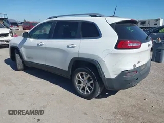 2016 Jeep Cherokee Latitude z VIN 1C4PJLCS0GW138381, wystawiony jako IAAI lot #41844589 z przebiegiem 100 991 mil mil oraz . Historia ofert i sprzedaży dostępna na DreamBid. Obrazek 3.