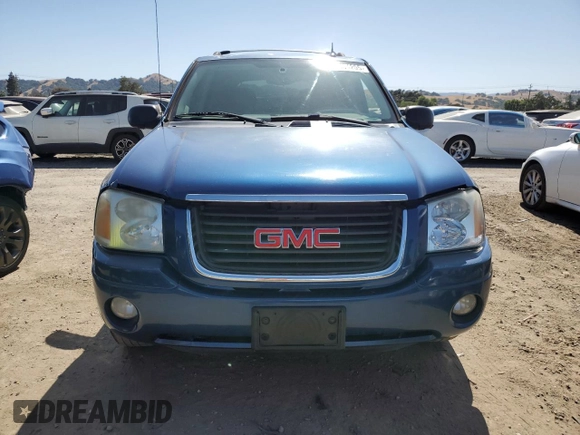 2005 GMC Envoy SLE with VIN 1GKDS13S452173325, listed as a Copart auction lot 61304205 with 155,501 mi miles and Clean title. Bid and sale history available at DreamBid. Image 5.