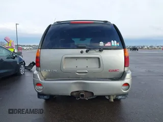 2003 GMC Envoy SLT with VIN 1GKDT13S532308502, listed as a IAAI auction lot 41676188 with 218,626 mi miles. Bid and sale history available at carsss.com. Image 16.
