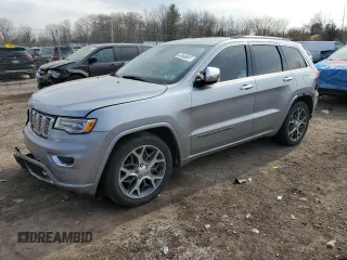 2019 Jeep Grand Cherokee Overland with VIN 1C4RJFCG9KC840084, listed as a Copart auction lot 47440845 with 101,281 mi miles and Salvage Title. Bid and sale history available at carsss.com. Image 1.