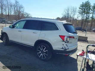 2019 Honda Pilot Touring 7-Passenger with VIN 5FNYF6H61KB007332, listed as a IAAI auction lot 41853466 with 80,056 mi miles. Bid and sale history available at carsss.com. Image 3.
