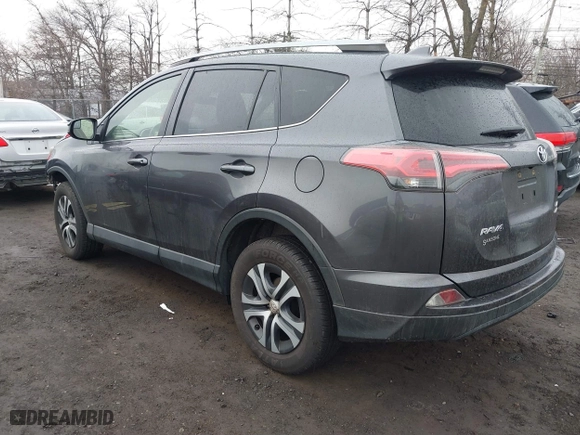 2018 Toyota RAV4 LE with VIN JTMBFREV0JJ223957, listed as a IAAI auction lot 41652810 with 144,629 mi miles. Bid and sale history available at carsss.com. Image 3.