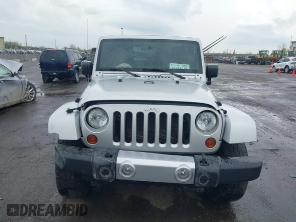 2010 Jeep Wrangler Sahara с VIN 1J4AA5D10AL166398, выставлен на аукционе IAAI как лот 42144530 с пробегом 140 020 миль миль и . История ставок и продаж доступна на DreamBid. Изображение 12.