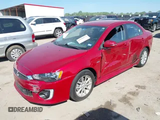 2016 Mitsubishi Lancer ES z VIN JA32U2FU3GU001857, wystawiony jako IAAI lot #41999674 z przebiegiem 65 520 mil mil oraz . Historia ofert i sprzedaży dostępna na DreamBid. Obrazek 17.