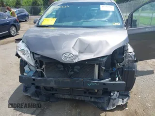 2014 Toyota Sienna LE AAS with VIN 5TDKK3DC3ES435091, listed as a IAAI auction lot 42735534 with 150,132 mi miles and . Bid and sale history available at DreamBid. Image 6.
