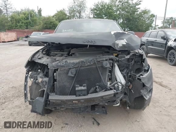 2020 Jeep Grand Cherokee Laredo E with VIN 1C4RJFAG2LC326761, listed as a IAAI auction lot 42434904 with 88,556 mi miles and . Bid and sale history available at DreamBid. Image 12.