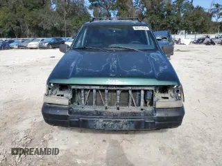 1996 Jeep Grand Cherokee Laredo with VIN 1J4GZ58S1TC340018, listed as a Copart auction lot 86571454 with 0 mi miles and Salvage Title. Bid and sale history available at carsss.com. Image 5.