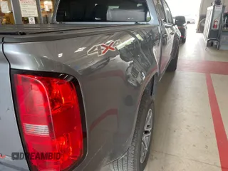 2021 Chevrolet Colorado 4WD Work Truck with VIN 1GCGTBEN0M1131662, listed as a IAAI auction lot 42788983 with 78,205 mi miles and . Bid and sale history available at DreamBid. Image 20.