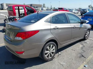 2013 Hyundai Accent GLS with VIN KMHCU4AE3DU314187, listed as a IAAI auction lot 42001713 with 99,845 mi miles. Bid and sale history available at carsss.com. Image 4.