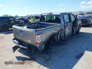 2022 Ram 1500 Lone Star with VIN 1C6RREFT3NN336321, listed as a IAAI auction lot 42190485 with 106,221 mi miles and . Bid and sale history available at DreamBid. Image 4.