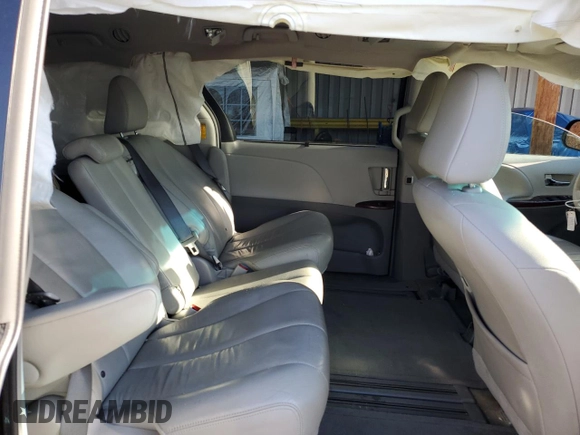 2014 Toyota Sienna XLE z VIN 5TDYK3DC6ES524504, wystawiony jako Copart lot #56509235 z przebiegiem Nie podano mil oraz Szkoda całkowita • Salvage title. Historia ofert i sprzedaży dostępna na DreamBid. Obrazek 11.