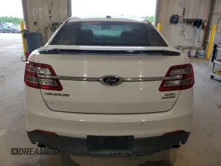2014 Ford Taurus SEL z VIN 1FAHP2E89EG121025, wystawiony jako Copart lot #55405535 z przebiegiem 168 004 mil mil oraz Czysty tytuł • Clean title. Historia ofert i sprzedaży dostępna na DreamBid. Obrazek 6.