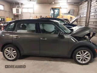 2012 MINI Countryman S with VIN WMWZC3C59CWL83491, listed as a IAAI auction lot 41791573 with 115,355 mi miles and . Bid and sale history available at DreamBid. Image 14.