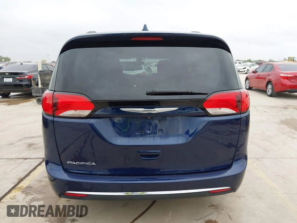 2017 Chrysler Pacifica Touring L with VIN 2C4RC1BG2HR526422, listed as a IAAI auction lot 42032839 with 180,710 mi miles and . Bid and sale history available at DreamBid. Image 16.